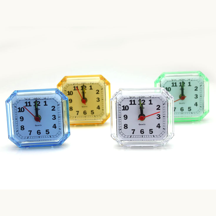 # 2107 # 24533 Mini Transparent alarm clock -hexagon 